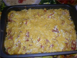Свинина, запеченная с картофелем, помидорами и сыром