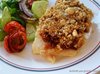 Треска запеченная под вялеными помидорами
