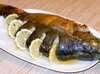 Карп, запеченный с овощами и грибами в духовке