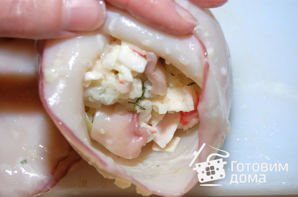 Кальмары, фаршированные рисом и крабовыми палочками фото к рецепту 2