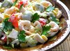 Салат с креветками, кальмарами, оливками и кукурузой
