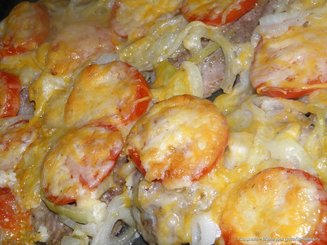 Свинина, запеченная с помидорами