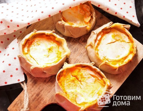 Скландраусис (ржаные открытые пирожки с картофельно морковной начинкой) фото к рецепту 10