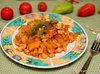 Курица, тушеная с овощами в томатно-сливочно-грибном соусе