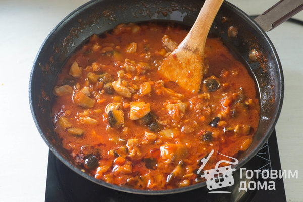 Курица, тушенная с баклажанами и овощами фото к рецепту 11