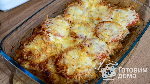 Тилапия запеченная в духовке с сыром и помидором фото к рецепту 1