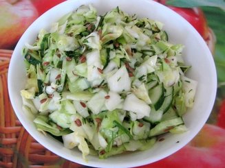 Салат с молодой капустой и огурцами