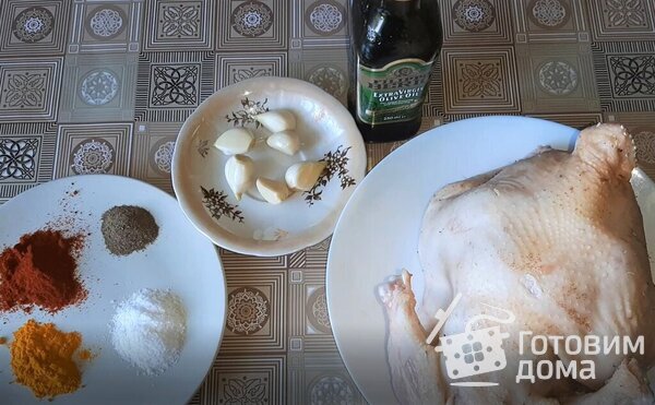 Курица, запеченная в духовке целиком фото к рецепту 1
