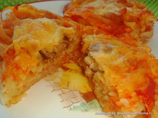 Запеченные под сыром гнезда-спагетти с фаршем и грибами