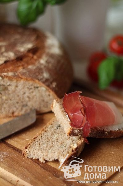 Хлеб со смешанной мукой и семечками на ржаной закваске фото к рецепту 7