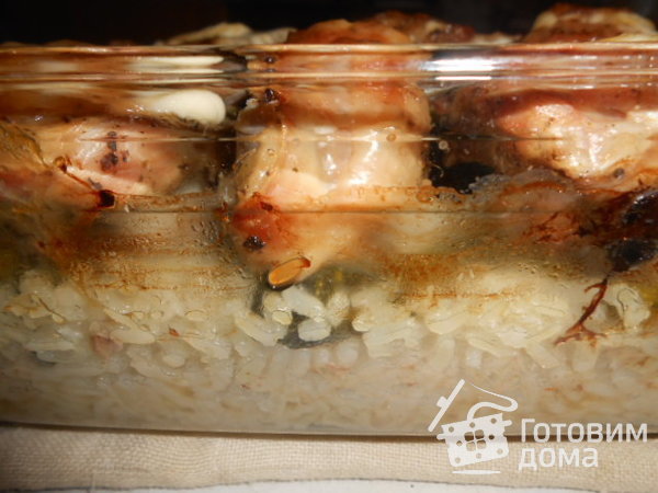 Курица запечённая на подушке из риса и кабачков фото к рецепту 11
