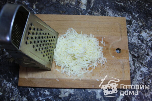 Запеченная картошка с сосисками, сыром и помидорами фото к рецепту 8